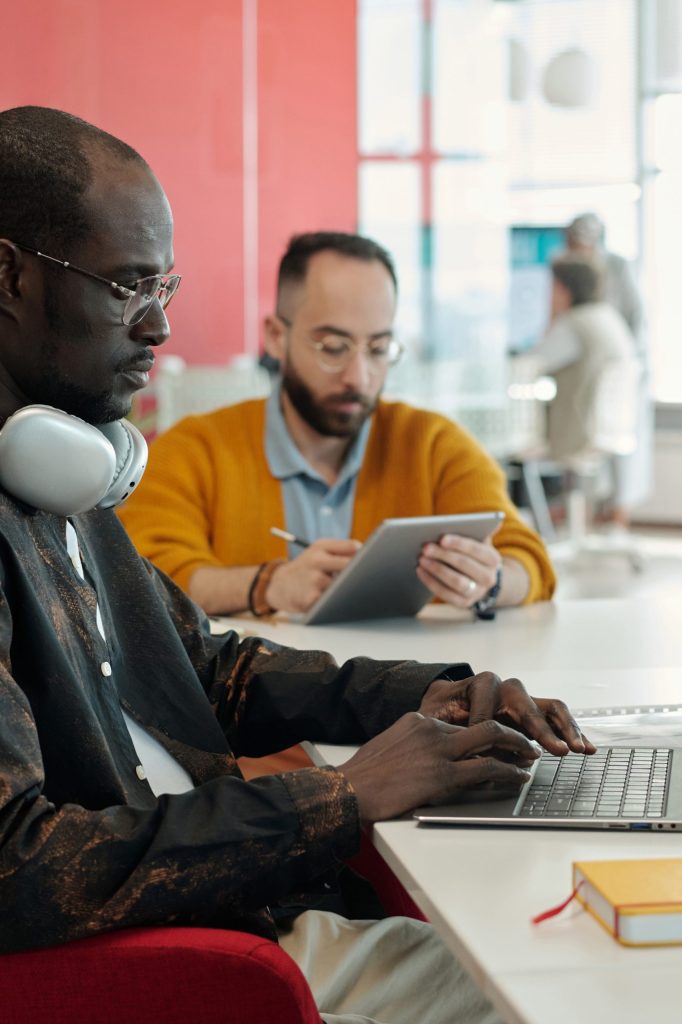 Colleagues participating in online training